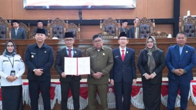 Pj Bupati Muara Enim Siap Dukung Transisi Pemerintahan, Hadiri Sidang Paripurna Penetapan Bupati dan Wabup Terpilih